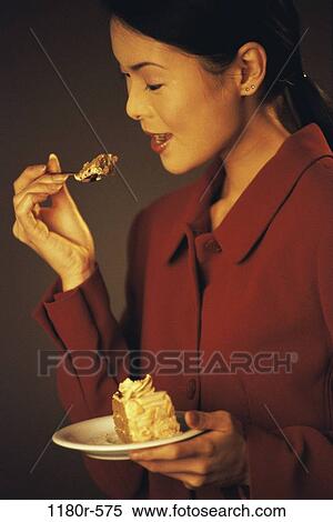 people, eating, woman, Asian, fork, plate, cake View Large Photo Image Stock Photography - people, eating, woman, Asian, fork, plate, cake. Fotosearch
