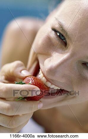 people, eating, woman, face, healthy, fruit, strawberry View Large Photo Image Stock Image - people, eating, woman, face, healthy, fruit, strawberry. Fotosearch