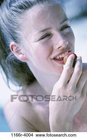 people, eating, woman, healthy, fruit, strawberry, health View Large Photo Image Picture - people, eating, woman, healthy, fruit, strawberry, health. Fotosearch