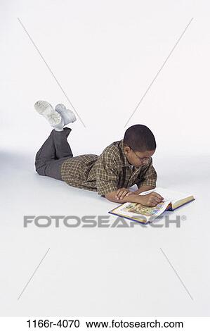 people, eyeglasses, reading, book, concentrating, boy, child View Large Photo Image Stock Image - people, eyeglasses, reading, book, concentrating, boy, child. Fotosearch