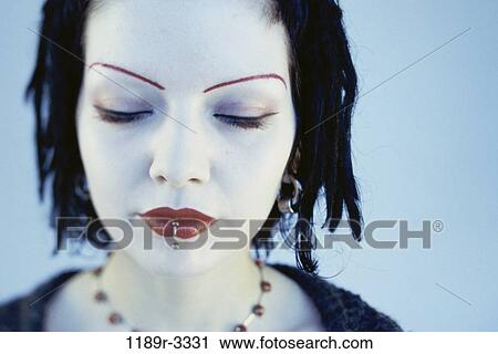 Stock Image - people, eyes, Gothic, individuality, closed, close, piercing. Fotosearch