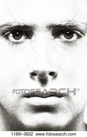 Stock Image - people, face, serious, indoors, close-up, Caucasian. Fotosearch