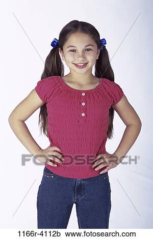 Stock Image - people, girl, child, posing, brunette, indoors, Caucasian. Fotosearch