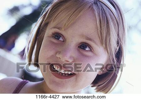 Stock Photo - people, girl, outdoors, child, blond, headband, indoors. Fotosearch
