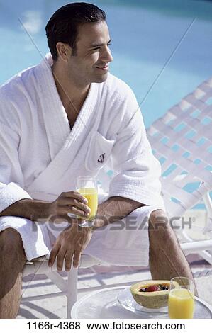 people, glass, pool, morning, sitting, Hispanic View Large Photo Image Stock Photo - people, glass, pool, morning, sitting, Hispanic. Fotosearch