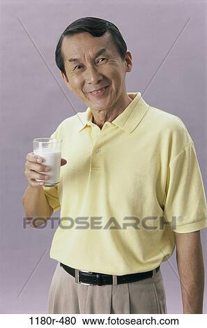 people, glass, smiling, Asian, healthy, milk View Large Photo Image Stock Image - people, glass, smiling, Asian, healthy, milk. Fotosearch
