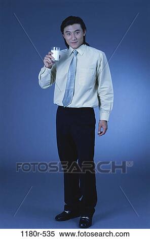 Stock Photography - people, glass, tie, Asian, healthy, milk. Fotosearch