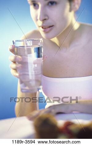 people, glass, water, woman, Hispanic, healthy, drinking View Large Photo Image Picture - people, glass, water, woman, Hispanic, healthy, drinking. Fotosearch