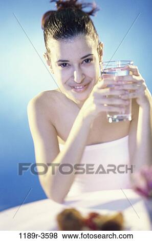 people, glass, water, woman, Hispanic, drinking, food View Large Photo Image Stock Photo - people, glass, water, woman, Hispanic, drinking, food. Fotosearch