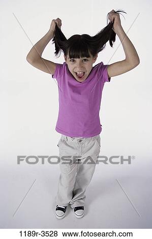 people, hair, girl, pulling, child, frustration, brunette View Large Photo Image Stock Photo - people, hair, girl, pulling, child, frustration, brunette. Fotosearch