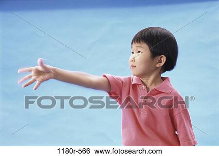 Stock Photograph - people, hand, Asian, boy, child, shaking, reaching. Fotosearch