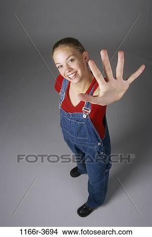 people, hand, gesturing, overalls, gesture, indoors View Large Photo Image Picture - people, hand, gesturing, overalls, gesture, indoors. Fotosearch
