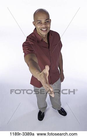 people, hand, greeting, handshake, indoors, offering View Large Photo Image Stock Image - people, hand, greeting, handshake, indoors, offering. Fotosearch