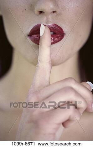 people, hand, woman, lips, quiet, indoors View Large Photo Image Stock Image - people, hand, woman, lips, quiet, indoors. Fotosearch