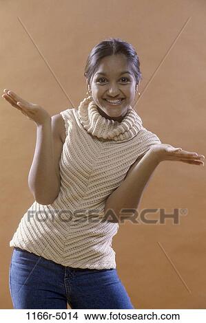 people, hands, Asian, Indian, posing, unsure, turtleneck View Large Photo Image Picture - people, hands, Asian, Indian, posing, unsure, turtleneck. Fotosearch