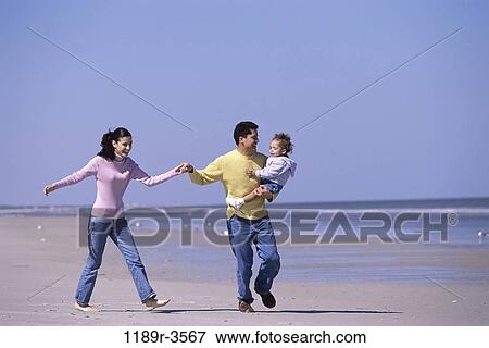 people, hands, walking, Hispanic, beach, holding, carrying View Large Photo Image Stock Photo - people, hands, walking, Hispanic, beach, holding, carrying. Fotosearch