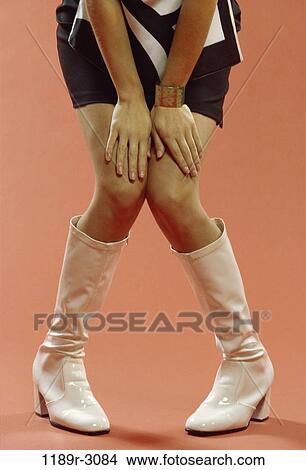 people, hands, woman, body parts, legs, boots, indoors View Large Photo Image Picture - people, hands, woman, body parts, legs, boots, indoors. Fotosearch