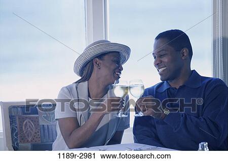 people, hat, couple, toasting, wine, drinking, toast View Large Photo Image Stock Image - people, hat, couple, toasting, wine, drinking, toast. Fotosearch