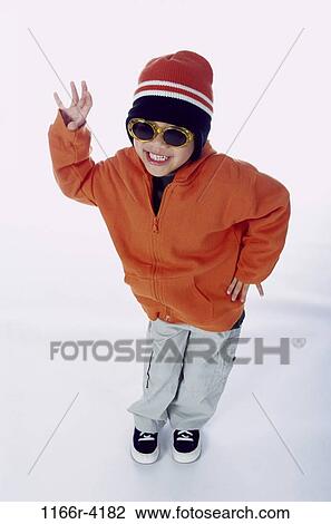 people, hat, sunglasses, boy, jacket, waving, child View Large Photo Image Stock Image - people, hat, sunglasses, boy, jacket, waving, child. Fotosearch
