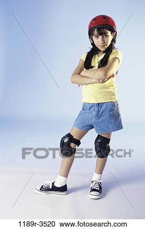 people, helmet, girl, serious, child, brunette, safety View Large Photo Image Stock Image - people, helmet, girl, serious, child, brunette, safety. Fotosearch