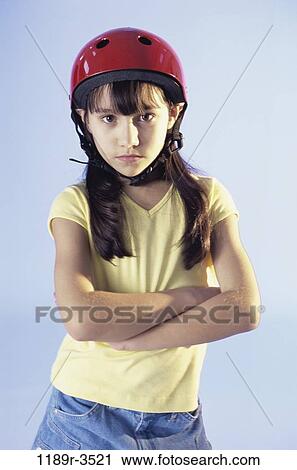 people, helmet, girl, serious, child, brunette, safety View Large Photo Image Stock Image - people, helmet, girl, serious, child, brunette, safety. Fotosearch