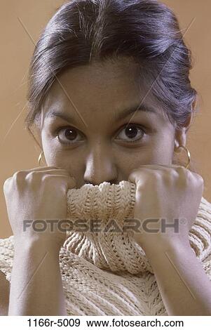 people, hiding, Asian, Indian, covering, turtleneck, shy View Large Photo Image Stock Photo - people, hiding, Asian, Indian, covering, turtleneck, shy. Fotosearch