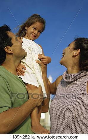 people, Hispanic, outdoors, carrying, family, shoulder, daughter View Large Photo Image Stock Image - people, Hispanic, outdoors, carrying, family, shoulder, daughter. Fotosearch