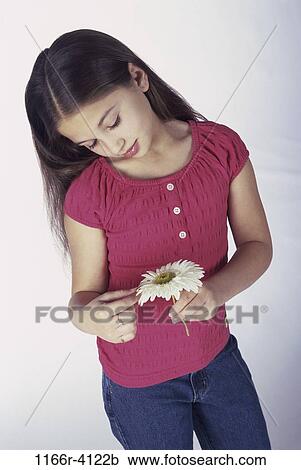 people, holding, girl, flower, child, admiring, brunette View Large Photo Image Stock Image - people, holding, girl, flower, child, admiring, brunette. Fotosearch