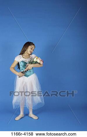 people, holding, girl, flowers, costume, ballet, child View Large Photo Image Stock Photo - people, holding, girl, flowers, costume, ballet, child. Fotosearch