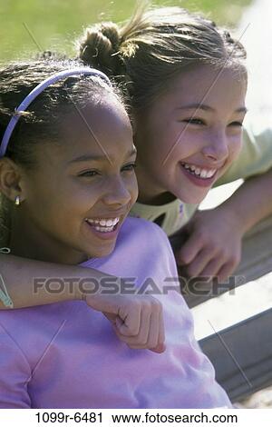 people, hugging, friends, children, hug, girls, portrait View Large Photo Image Stock Image - people, hugging, friends, children, hug, girls, portrait. Fotosearch