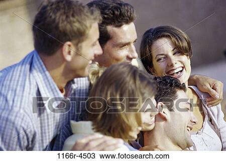 Stock Image - people, laughing, outdoors, friends, headshot, laugh, Caucasian. Fotosearch