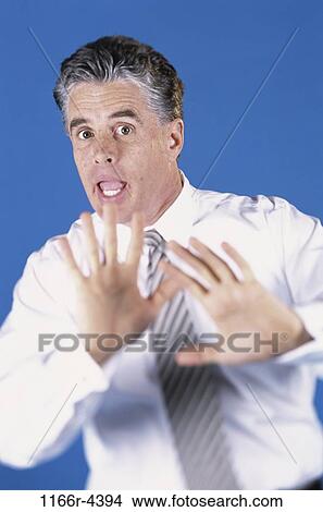 people, Middle-aged, frightened, brunette, indoors, Caucasian View Large Photo Image Picture - people, Middle-aged, frightened, brunette, indoors, Caucasian. Fotosearch