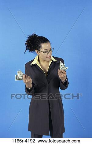 people, money, woman, glasses, finance, personal finance, currency View Large Photo Image Stock Image - people, money, woman, glasses, finance, personal finance, currency. Fotosearch