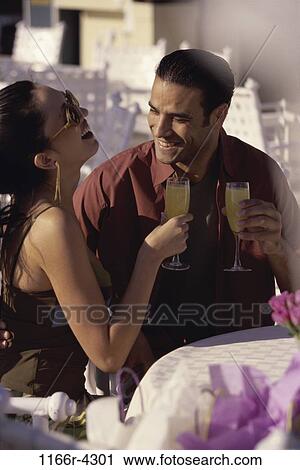 people, morning, couple, Hispanic, orange, drinking, laughing View Large Photo Image Stock Image - people, morning, couple, Hispanic, orange, drinking, laughing. Fotosearch
