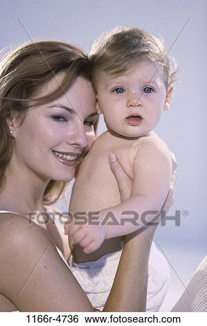 people, mother, baby, family, parent, indoors, Caucasian View Large Photo Image Stock Photograph - people, mother, baby, family, parent, indoors, Caucasian. Fotosearch