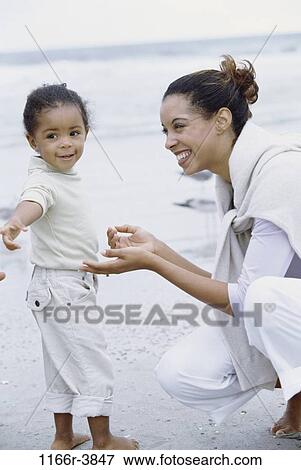 people, mother, beach, family, daughter, parent, African-American View Large Photo Image Stock Photo - people, mother, beach, family, daughter, parent, African-American. Fotosearch