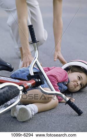 people, mother, bicycle, helmet, outdoors, bike, family View Large Photo Image Picture - people, mother, bicycle, helmet, outdoors, bike, family. Fotosearch