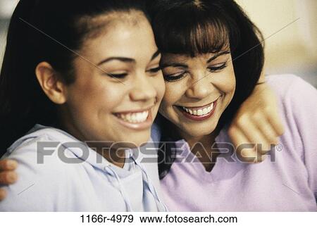 people, mother, Hispanic, hugging, family, hug View Large Photo Image Stock Photo - people, mother, Hispanic, hugging, family, hug. Fotosearch