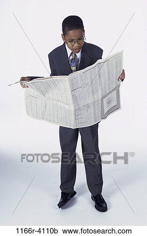 people, newspaper, suit, reading, boy, business, surprise View Large Photo Image Stock Image - people, newspaper, suit, reading, boy, business, surprise. Fotosearch