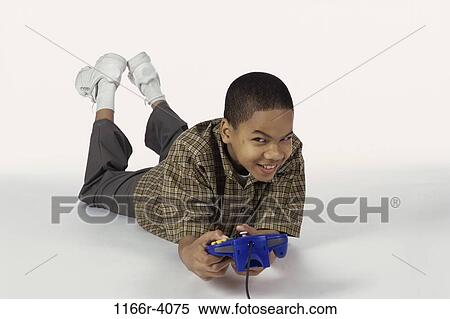 people, playing, boy, child, play, game, video View Large Photo Image Stock Photography - people, playing, boy, child, play, game, video. Fotosearch