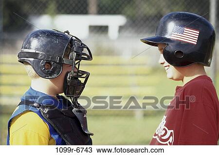 people, playing, face, helmet, baseball, mask, outdoors View Large Photo Image Stock Image - people, playing, face, helmet, baseball, mask, outdoors. Fotosearch