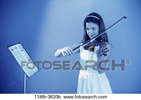 people, playing, girl, violin, child, play, indoors View Large Photo Image Stock Image - people, playing, girl, violin, child, play, indoors. Fotosearch