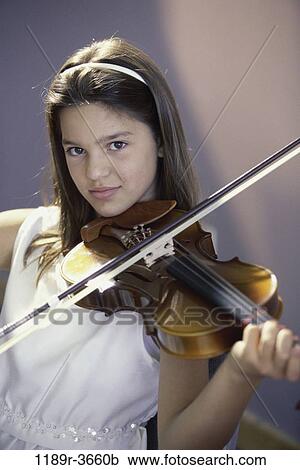 people, playing, girl, violin, child, play, brunette View Large Photo Image Stock Image - people, playing, girl, violin, child, play, brunette. Fotosearch