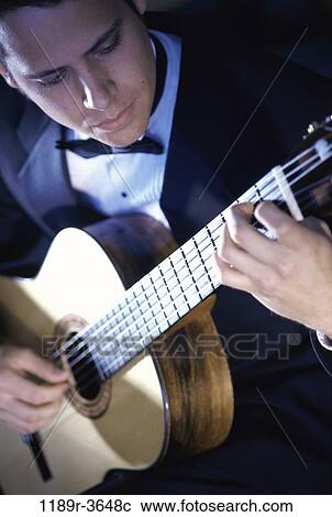 Stock Image - people, playing, guitar, arts, entertainment, play. Fotosearch