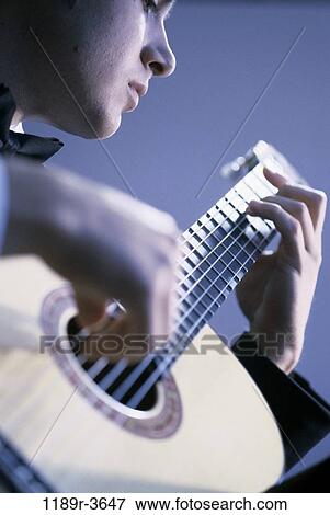 people, playing, guitar, arts, entertainment, play View Large Photo Image Stock Photo - people, playing, guitar, arts, entertainment, play. Fotosearch