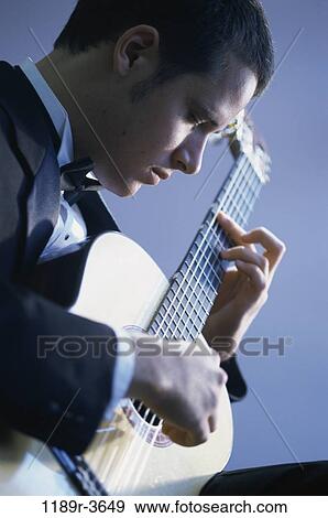 people, playing, guitar, arts, entertainment, play View Large Photo Image Stock Photo - people, playing, guitar, arts, entertainment, play. Fotosearch