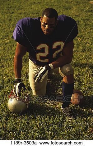 people, playing, helmet, ball, football, outdoors View Large Photo Image Stock Image - people, playing, helmet, ball, football, outdoors. Fotosearch