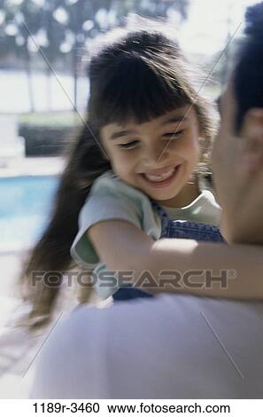 people, pool, Hispanic, outdoors, hugging, family, affection View Large Photo Image Stock Image - people, pool, Hispanic, outdoors, hugging, family, affection. Fotosearch