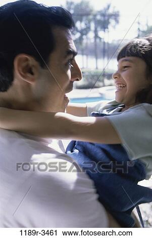 people, pool, Hispanic, playful, outdoors, hugging, family View Large Photo Image Stock Image - people, pool, Hispanic, playful, outdoors, hugging, family. Fotosearch
