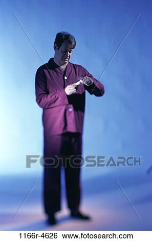 people, prescription, medicine, Middle-aged, illness, pajamas View Large Photo Image Stock Photograph - people, prescription, medicine, Middle-aged, illness, pajamas. Fotosearch